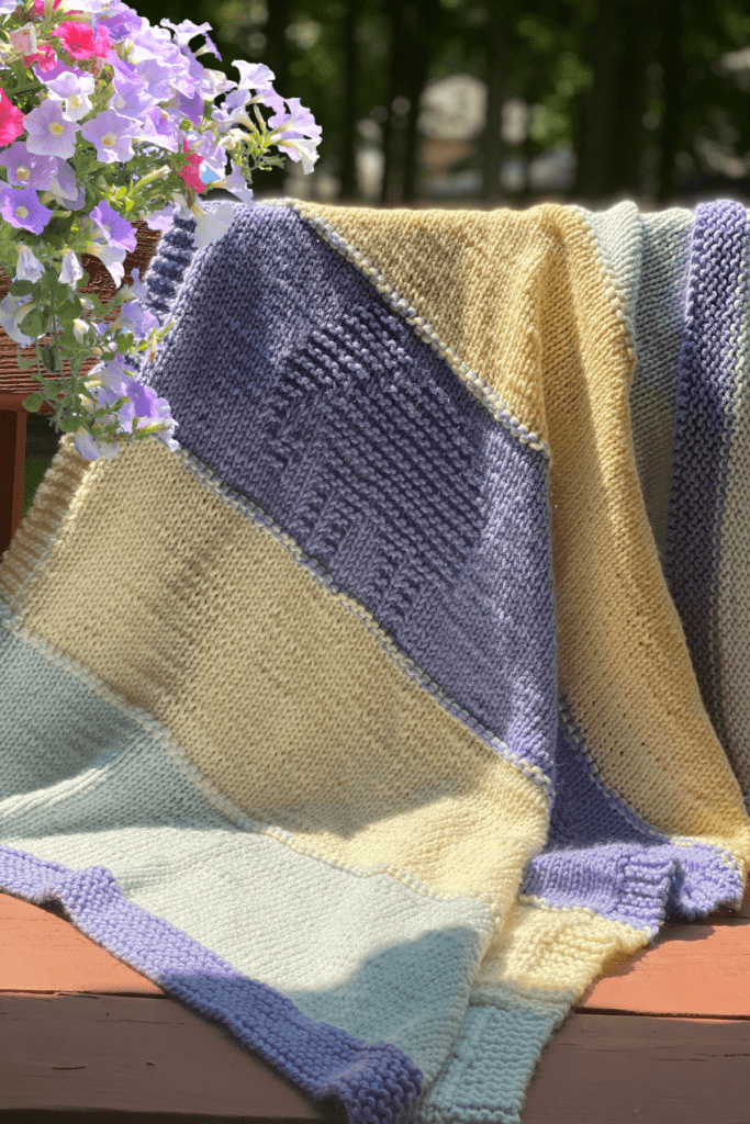 knit baby blanket with flower basket