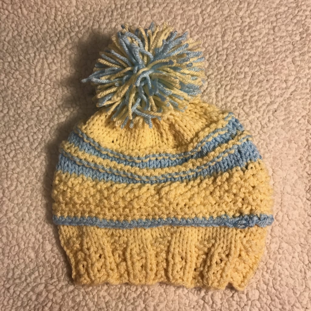 Cora’s Pompom Hat