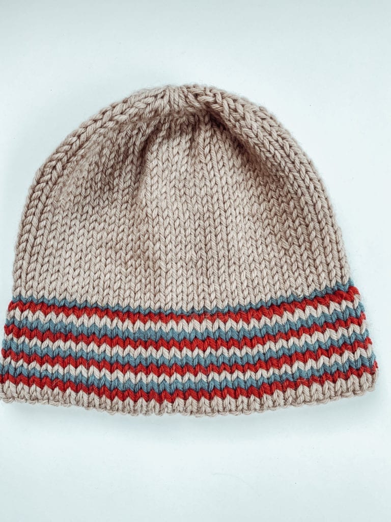 red white and tan striped knit hat