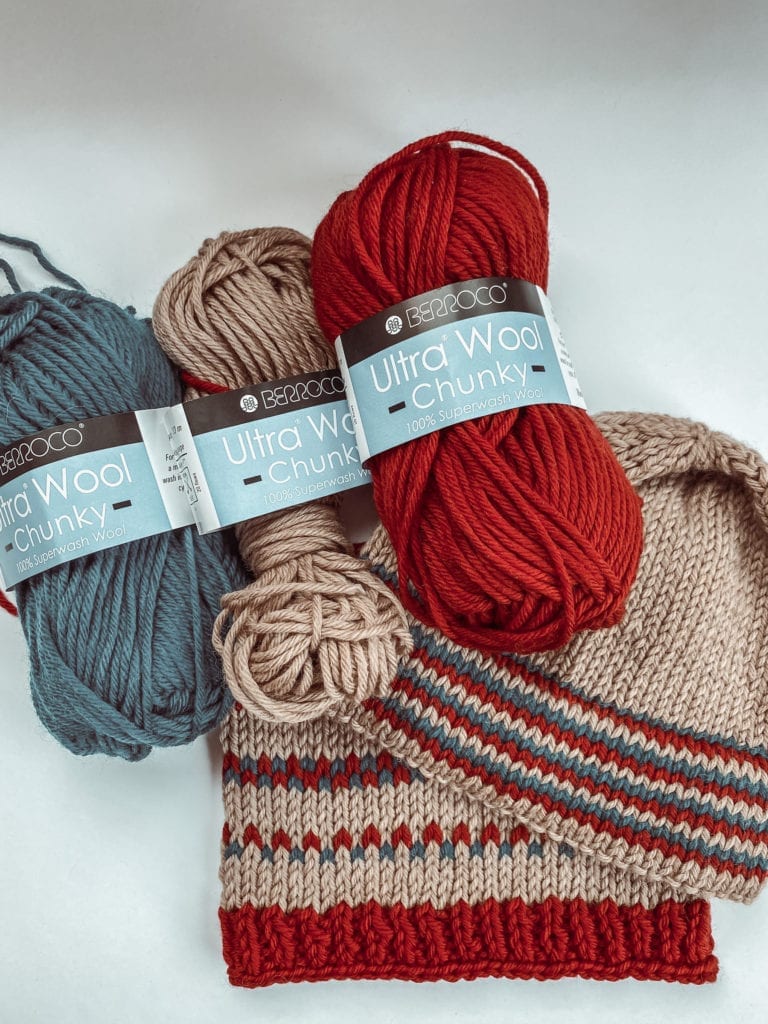 berroco yarn in blue, tan and red