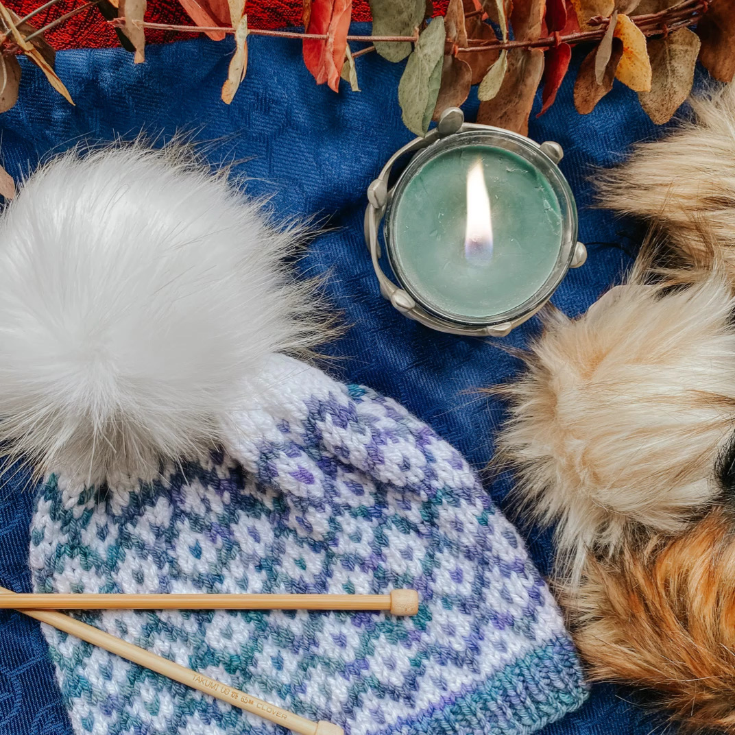 knit beanie with pompoms