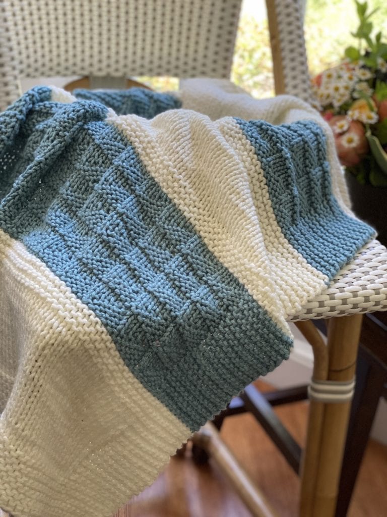 aqua and ivory hand knit blanket