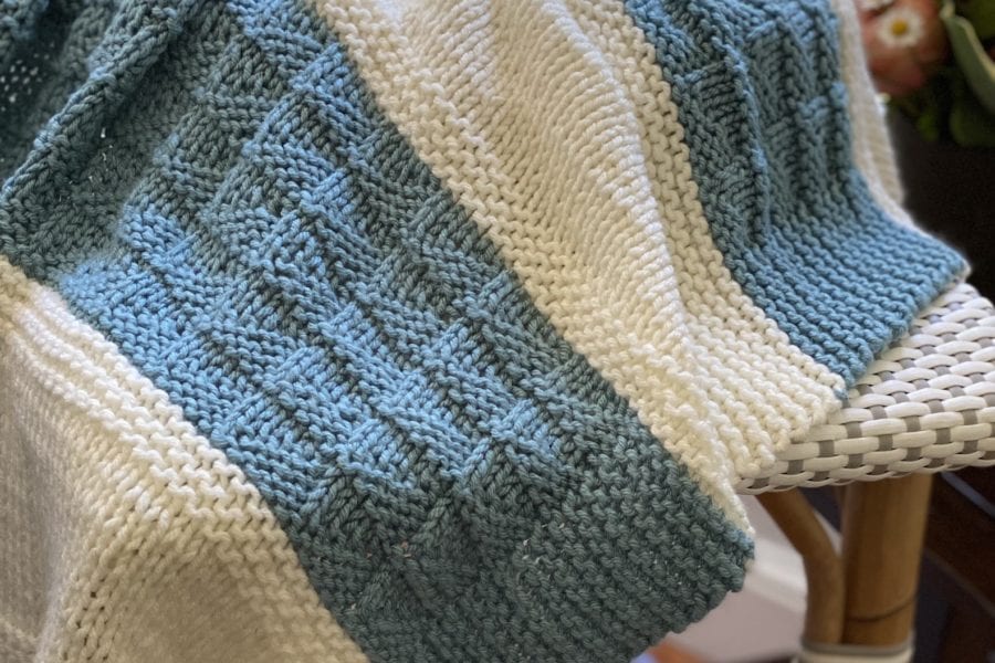 aqua and ivory hand knit blanket