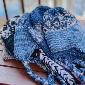 stack of fair isle knit hats