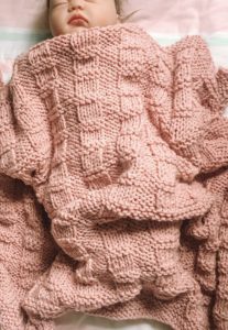 pink knit baby blanket