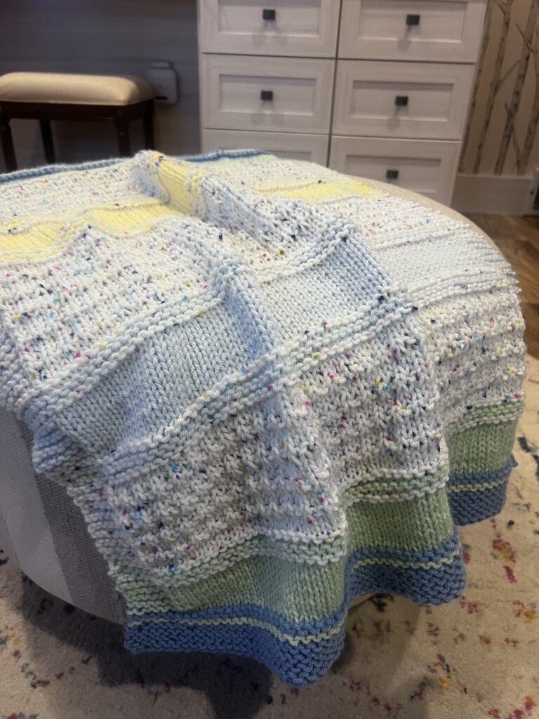 handknit pastel striped baby blanket