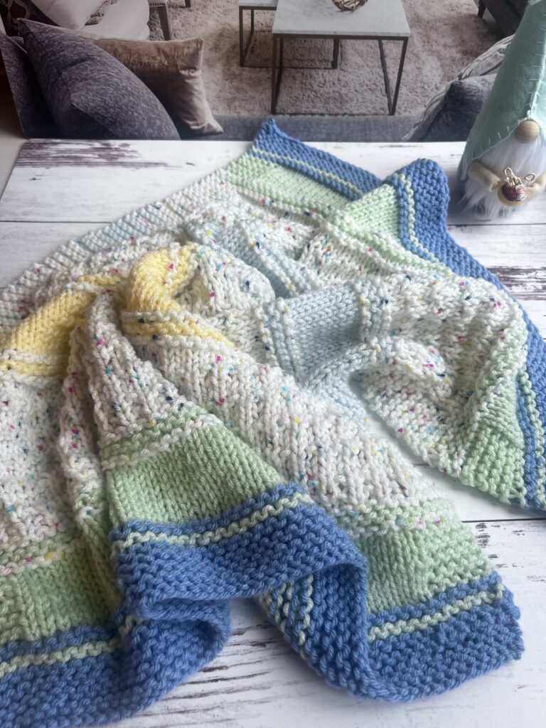 multicolored handknit baby blanket