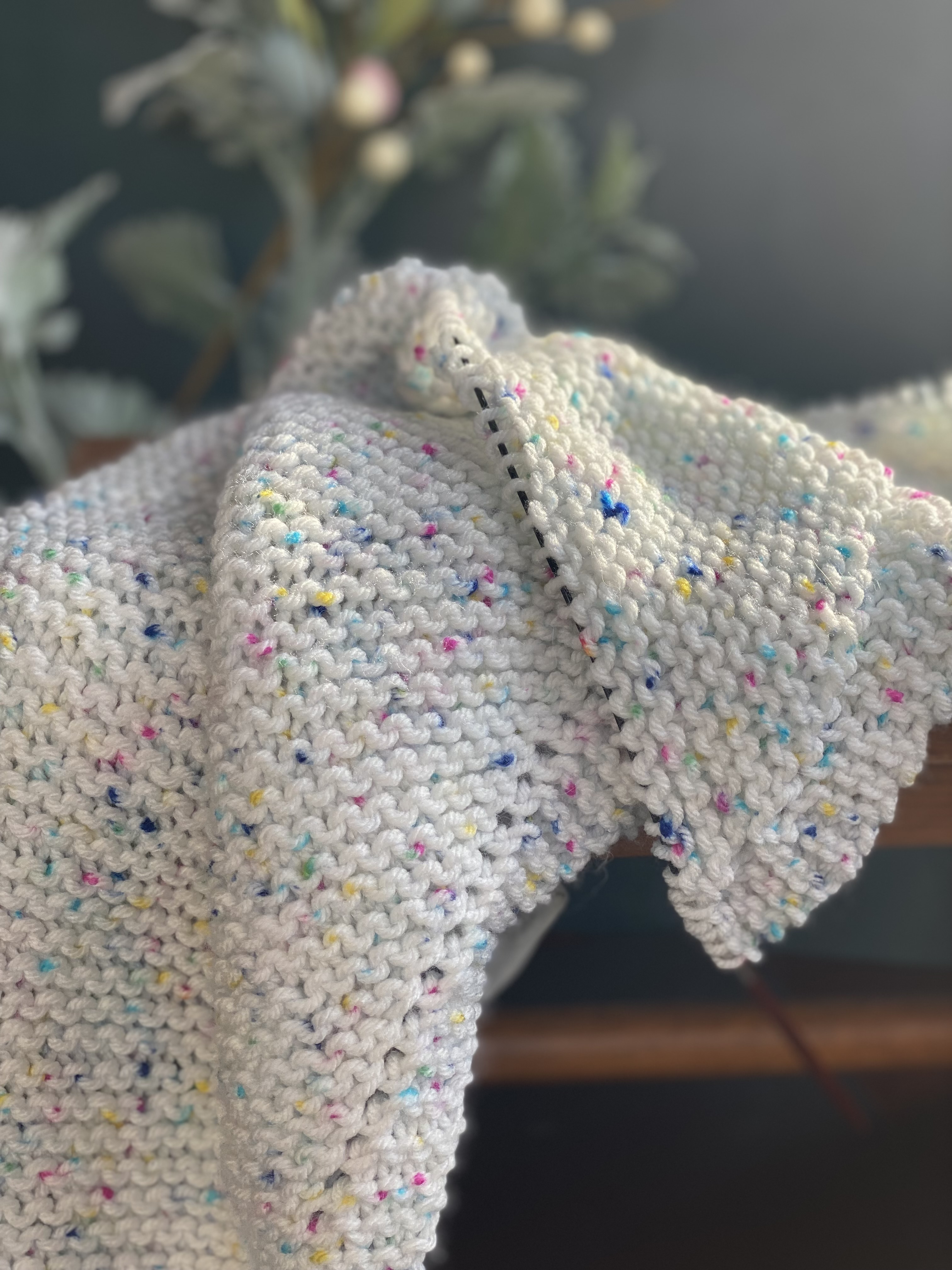 hand knit speckled baby blanket