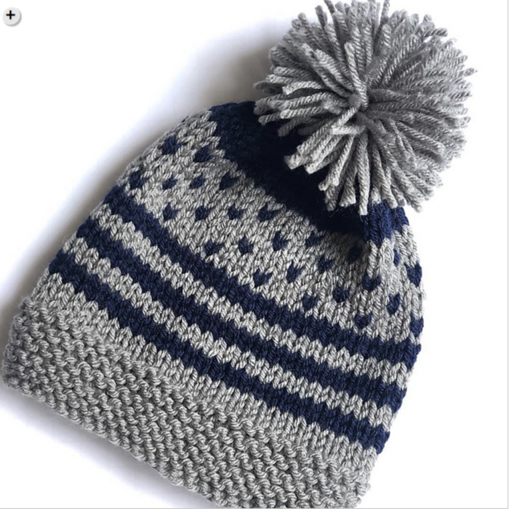 blue and gray striped hat with pompom