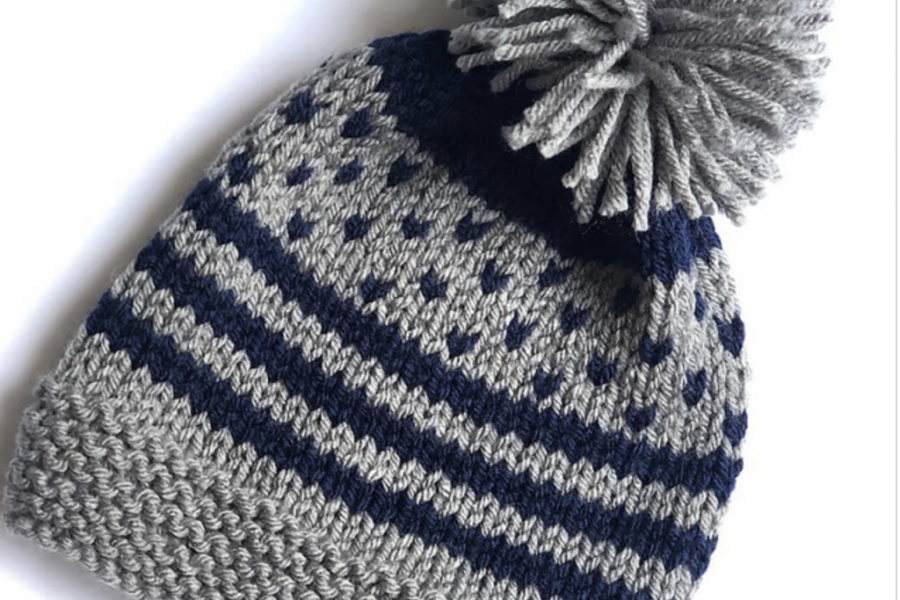 blue and gray striped hat with pompom