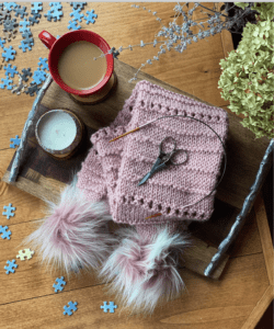 pink scarf with pompoms