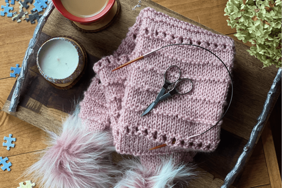 pink scarf with pompoms