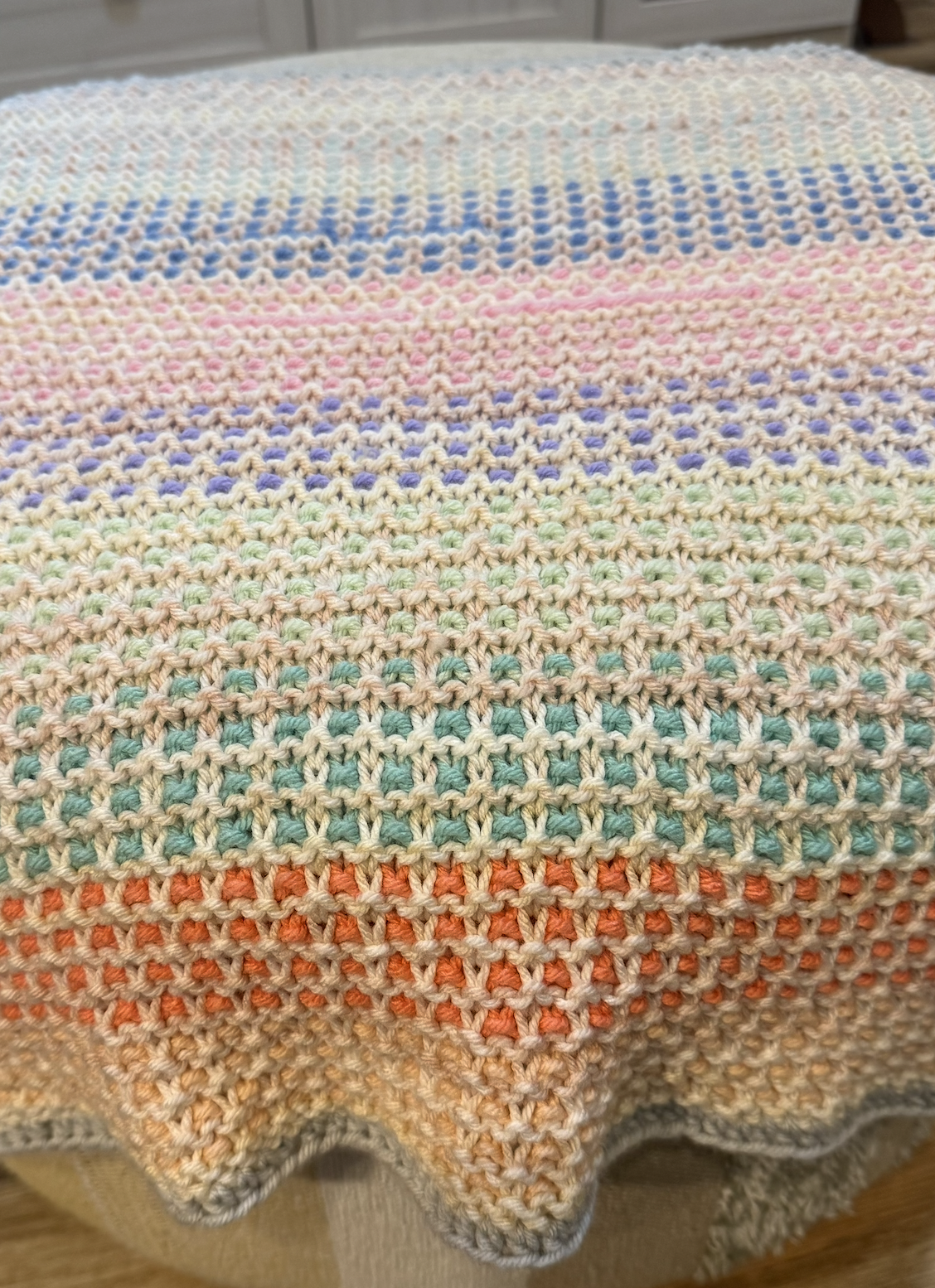 multi colored textured blanket