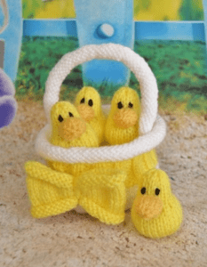 Toy ducks in a basket