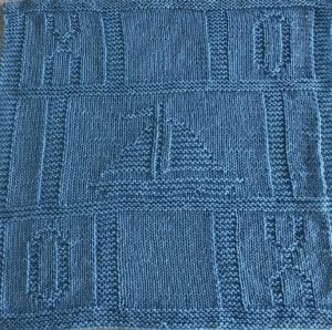 sailboat blanket with x and o's