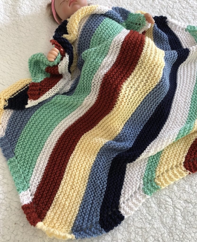 striped blanket with baby