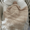 baby blanket in crib