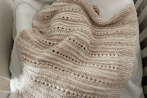 baby blanket in crib