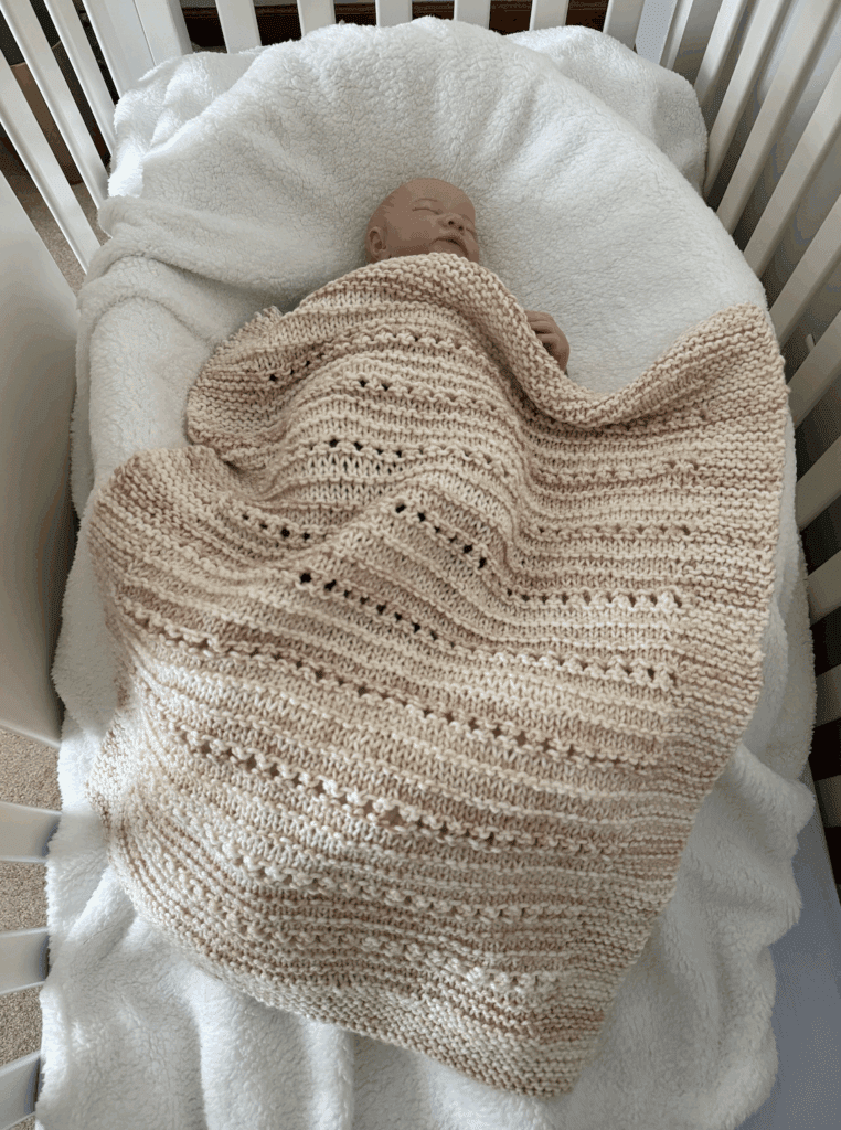 baby blanket in crib