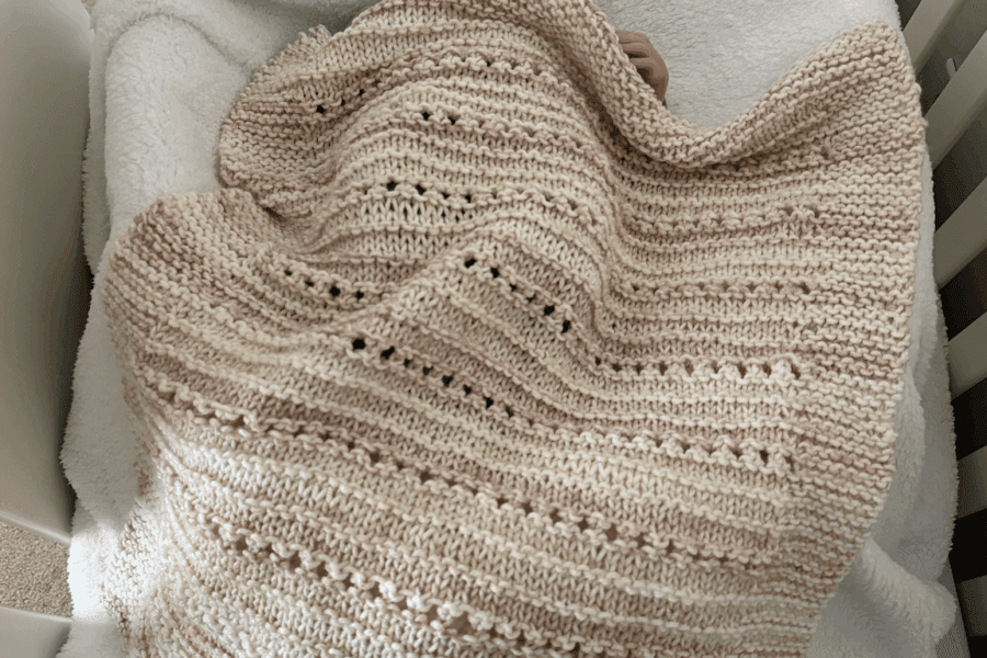 baby blanket in crib