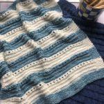 Knit baby blanket striped