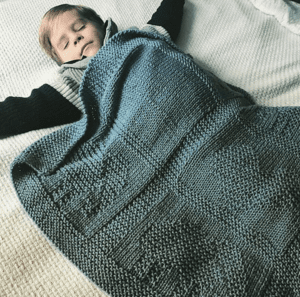 sleeping boy with elephant blanket