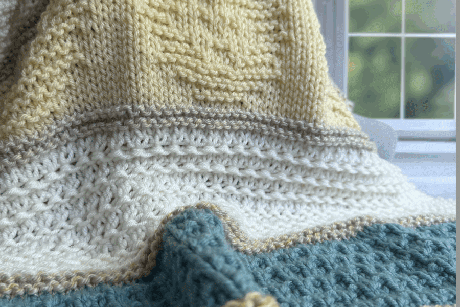 handknit baby blanket with lions