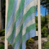 striped baby blanket on ladder