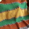 wide striped jungle themed knit blanket with lions
