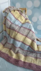 multi colored knit baby blanket