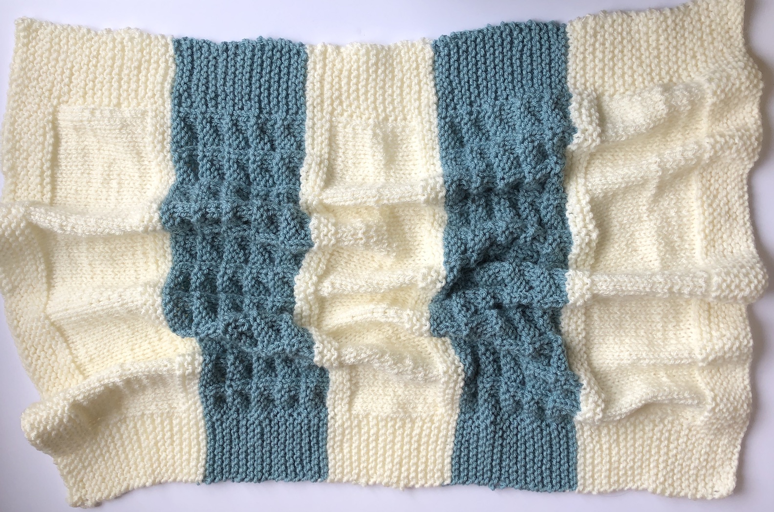 aqua and cream knit blanket