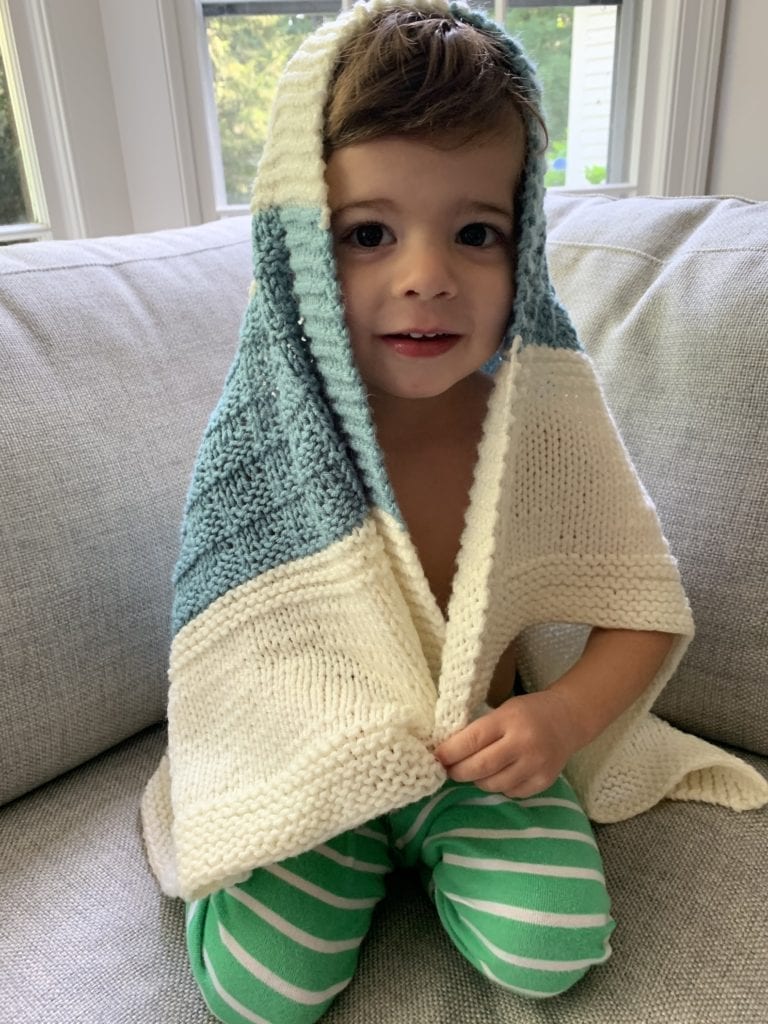 toddler with blanket