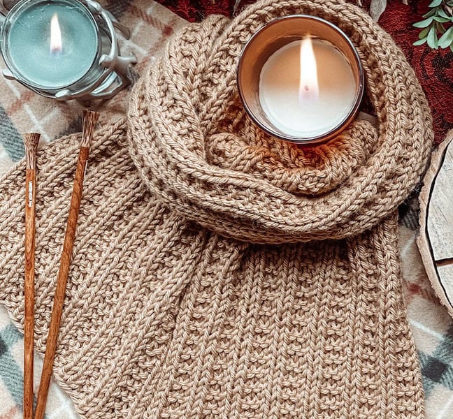 tan knit scarf with candles