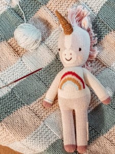 knit baby blanket and unicorn