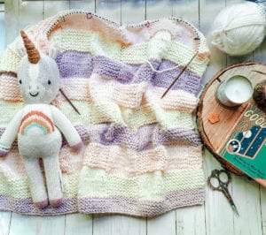 baby blanket and unicorn doll