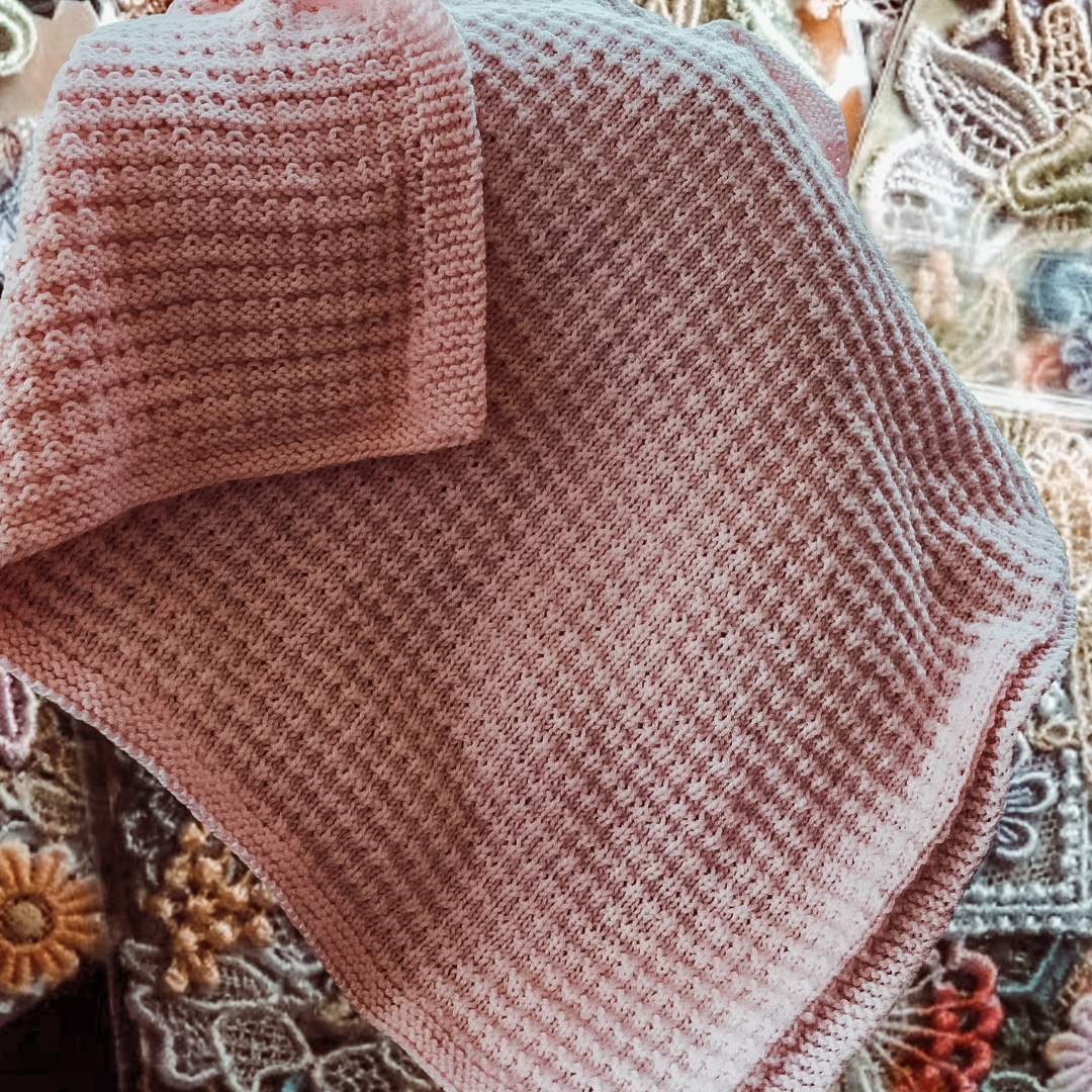pink textured knit blanket