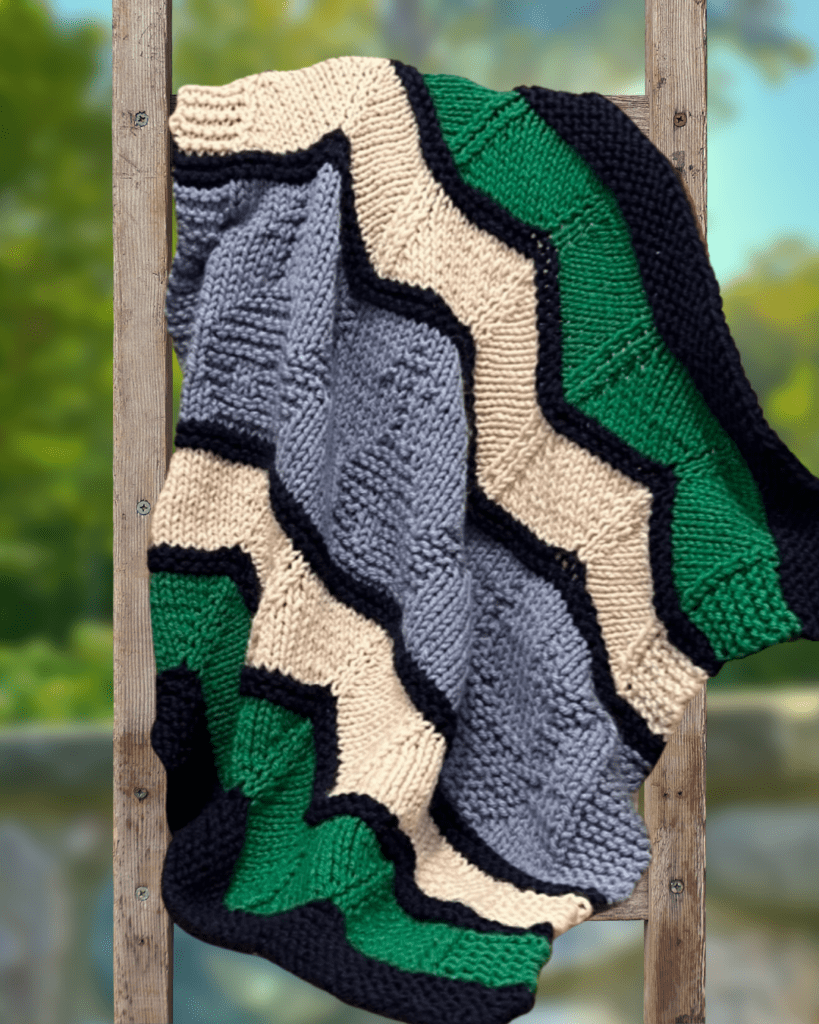 whale themed blanket on a ladder